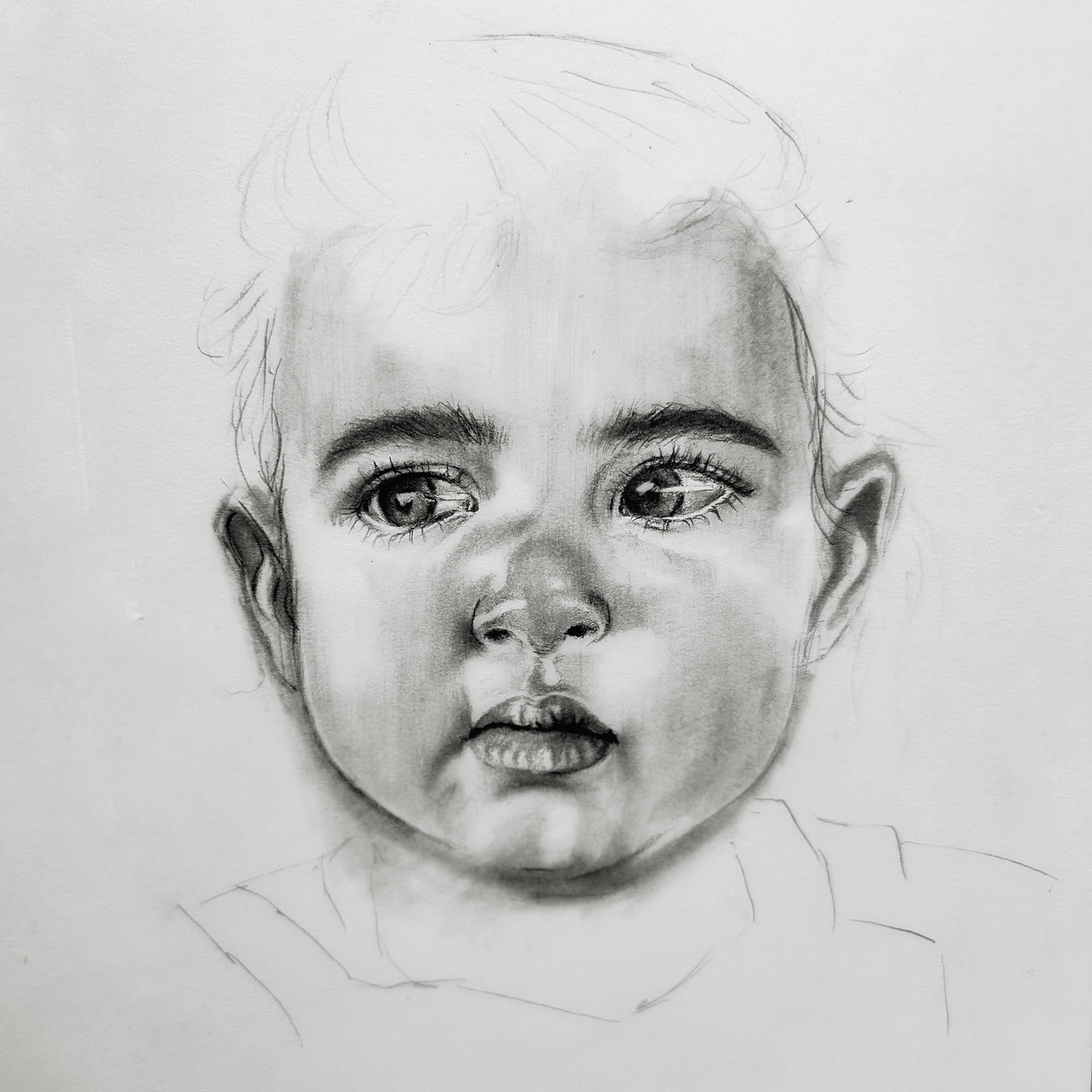 A detailed black and white pencil sketch of a baby's face, showing expressive eyes, delicate hair, and soft shading on a light background.